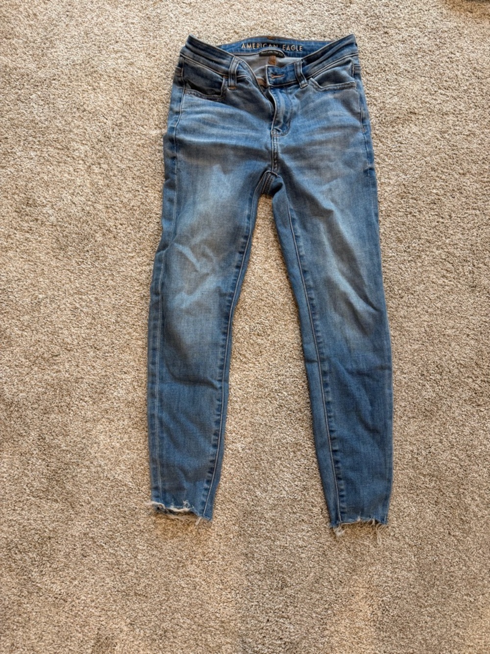 American Eagle Outfitters Light Blue Skinny Jeans with Raw Hem